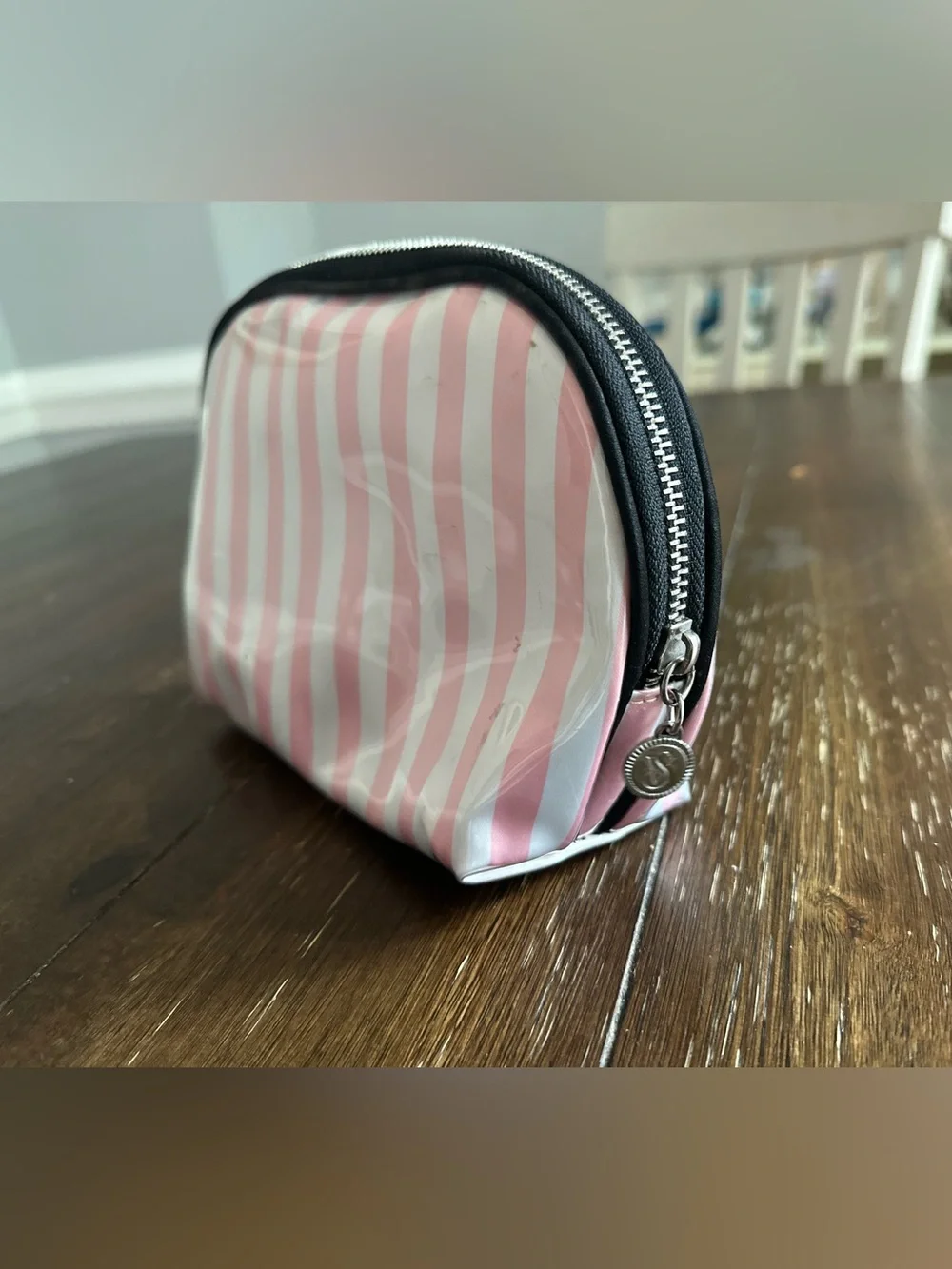 Victoria’s Secret striped cosmetics bag